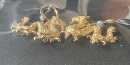 Butler and Wilson Chinese Dragon crystal drop earrings in gold tone sealed in original box