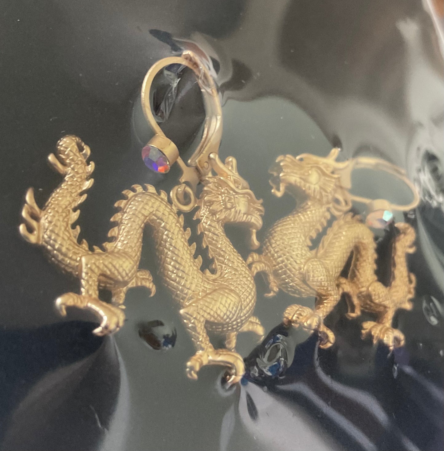 Butler and Wilson Chinese Dragon crystal drop earrings in gold tone sealed in original box