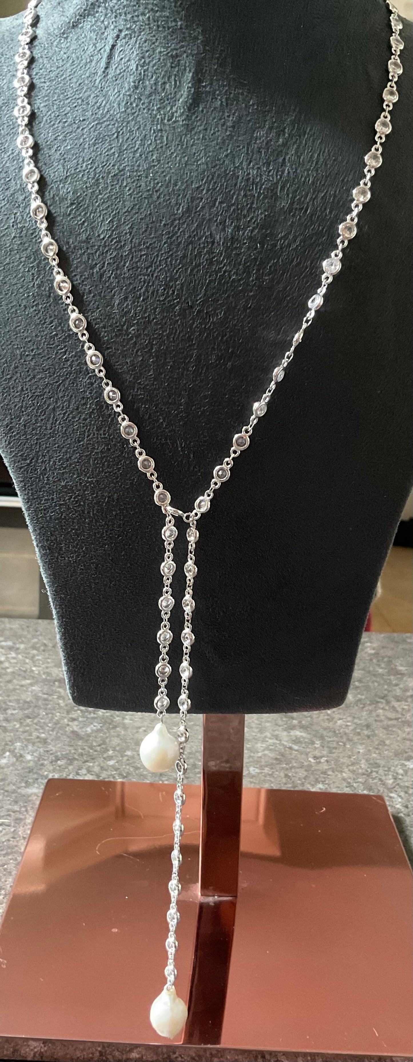 Butler and Wilson Faux Baroque Pearl Lariat necklace in silver tone with bezel set crystals