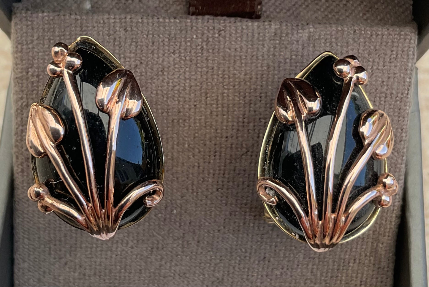 Clogau 9ct Black Onyx Nightfall stud earrings in yellow and rose gold with post and clip for pierced ears