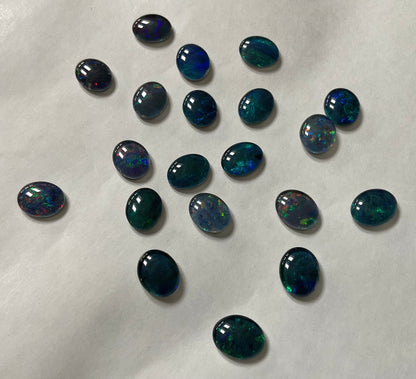 20 x triplet opal cabochons approximately 10x7mm flashes varied colours including reds greens yellows blues