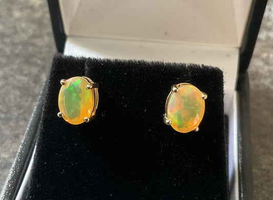 10K Ethiopian Welo Opal Oval cut stud earrings 8x6mm yellow gold TGGC