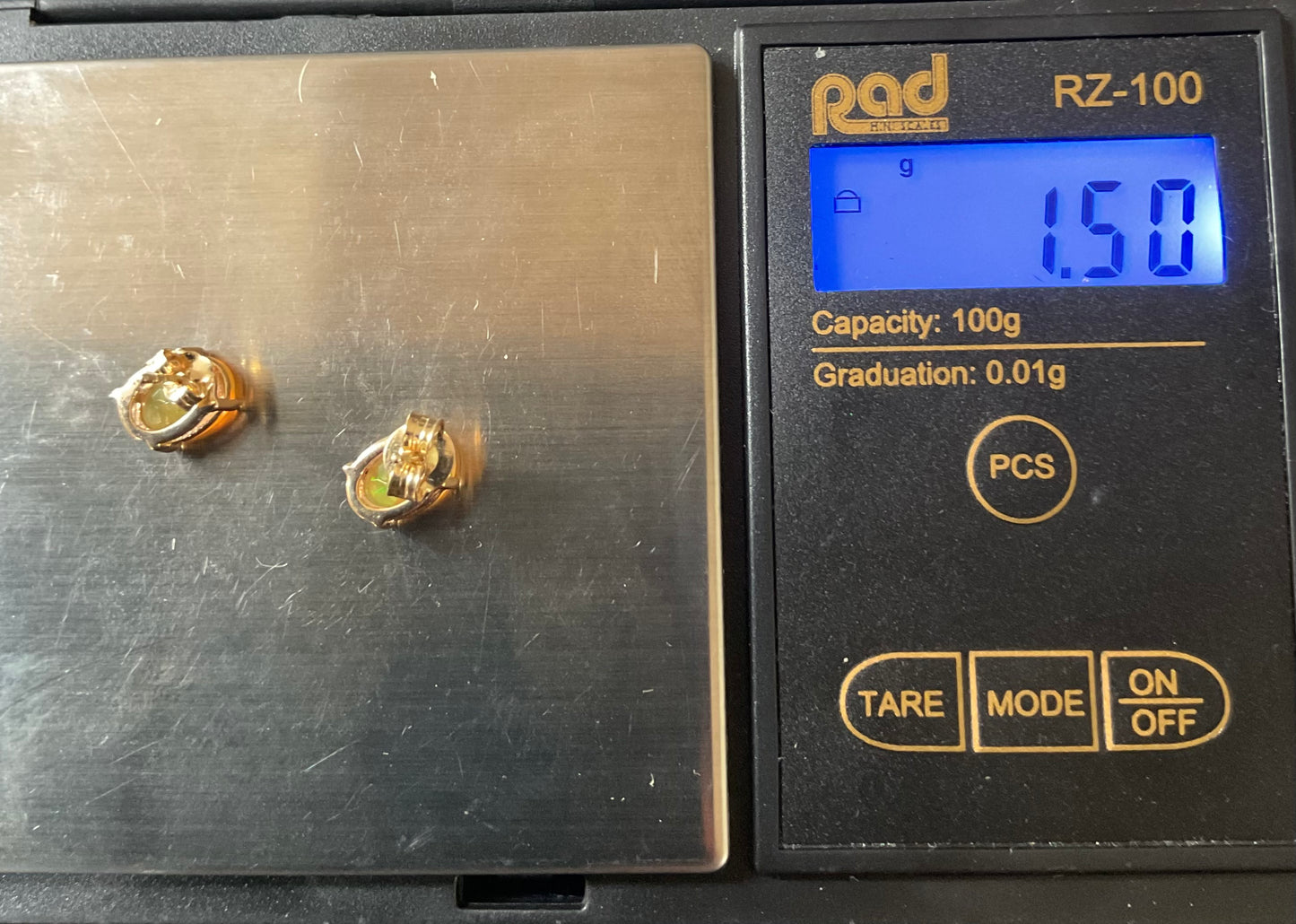 10K Ethiopian Welo Opal Oval cut stud earrings 8x6mm yellow gold TGGC