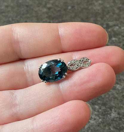 10K Oval 14x10mm London Blue Topaz and Diamond pendant (no chain) white gold TGGC