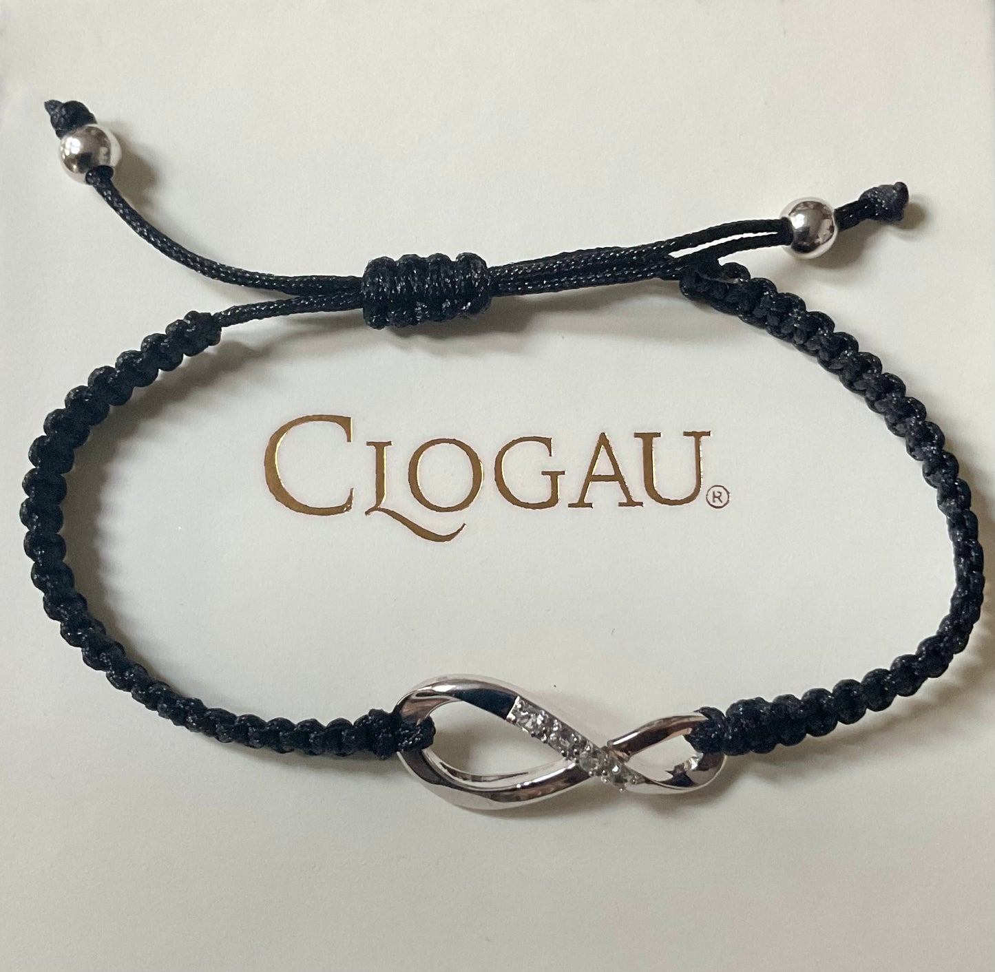 Clogau White Topaz Eternity friendship bracelet with adjustable black cord band in silver and rose gold