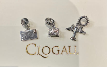 Clogau Suitcase, Postcard and Aeroplane Milestones charms in Silver and rose gold