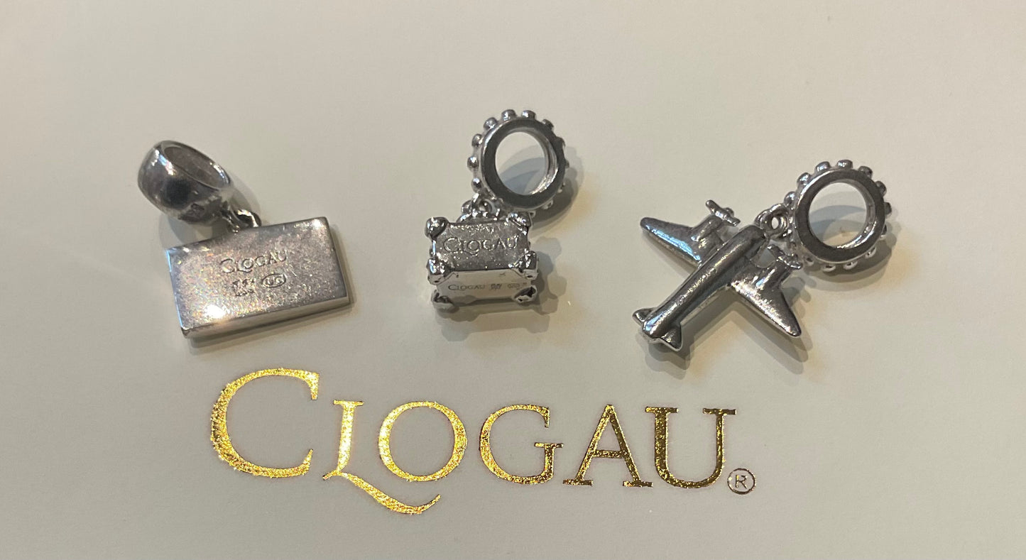 Clogau Suitcase, Postcard and Aeroplane Milestones charms in Silver and rose gold