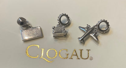 Clogau Suitcase, Postcard and Aeroplane Milestones charms in Silver and rose gold