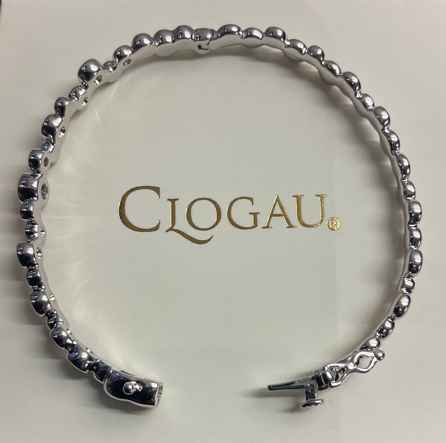 Clogau Celebration White Topaz bangle bracelet in silver and rose gold