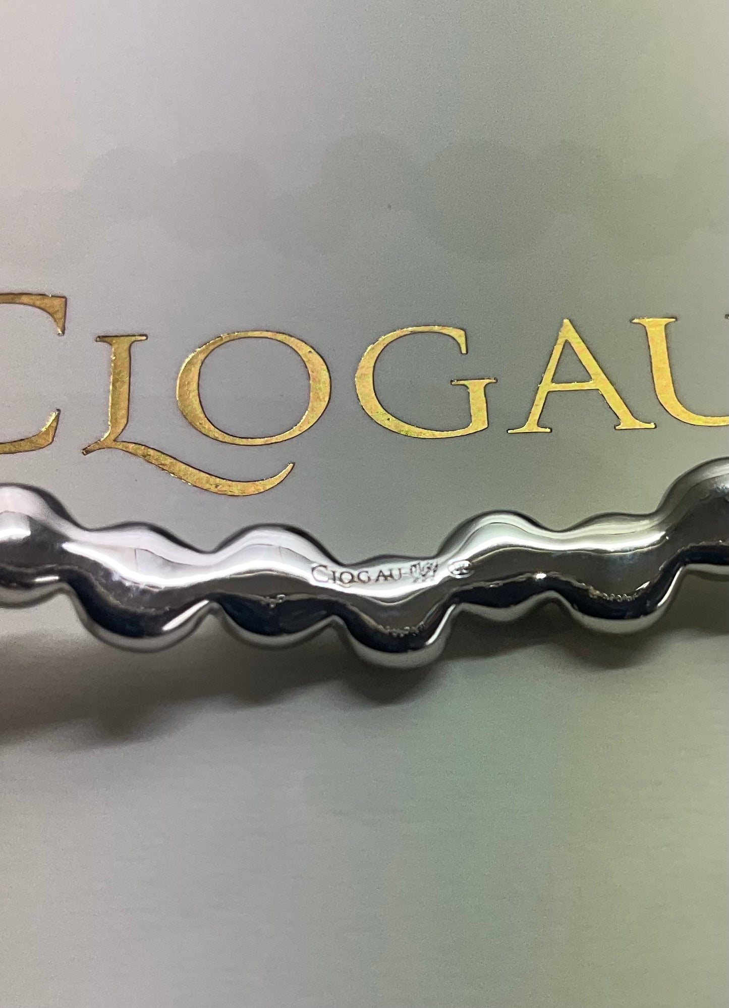 Clogau Celebration White Topaz bangle bracelet in silver and rose gold