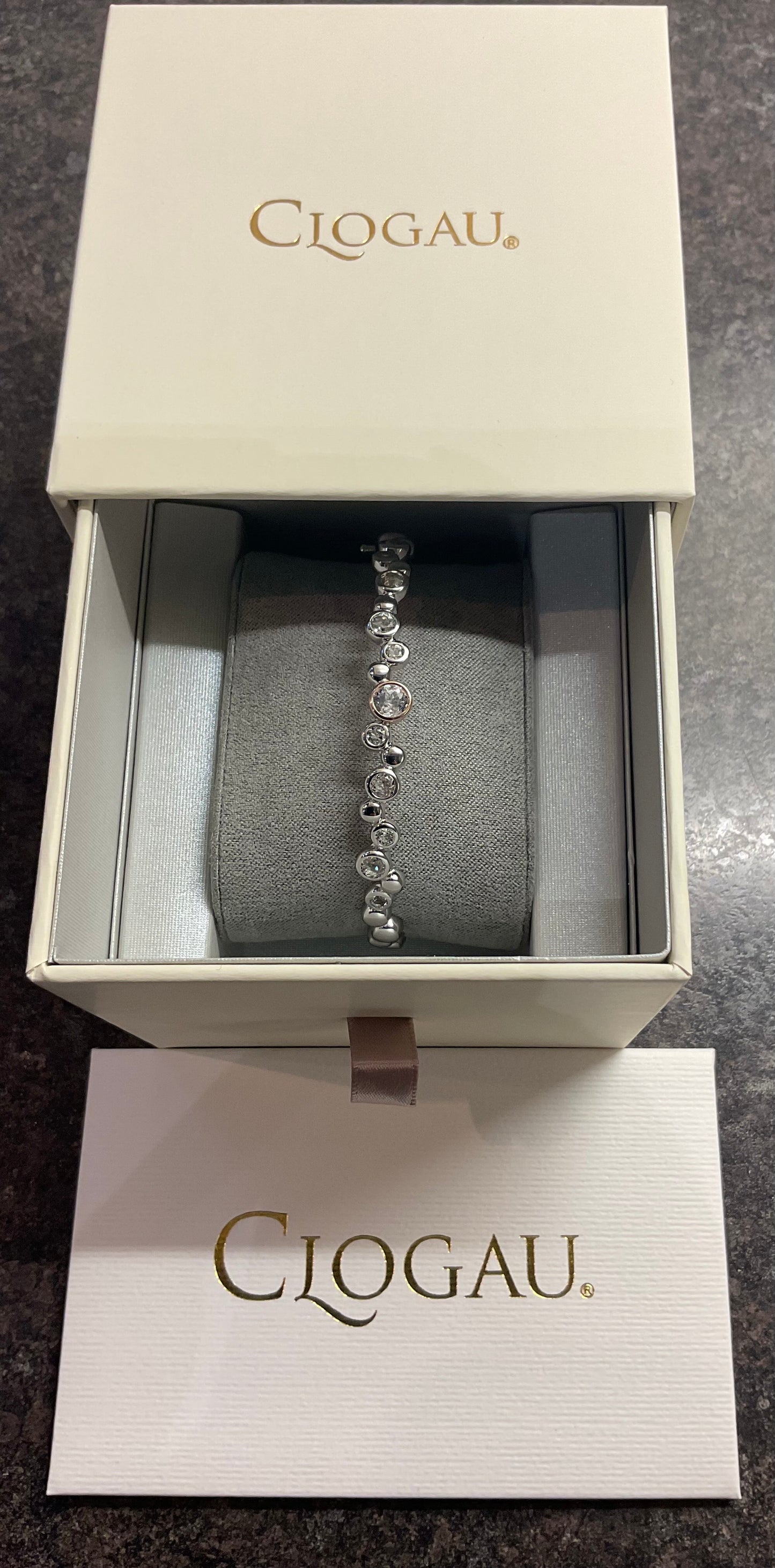 Clogau Celebration White Topaz bangle bracelet in silver and rose gold