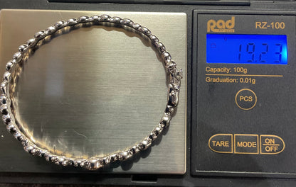 Clogau Celebration White Topaz bangle bracelet in silver and rose gold