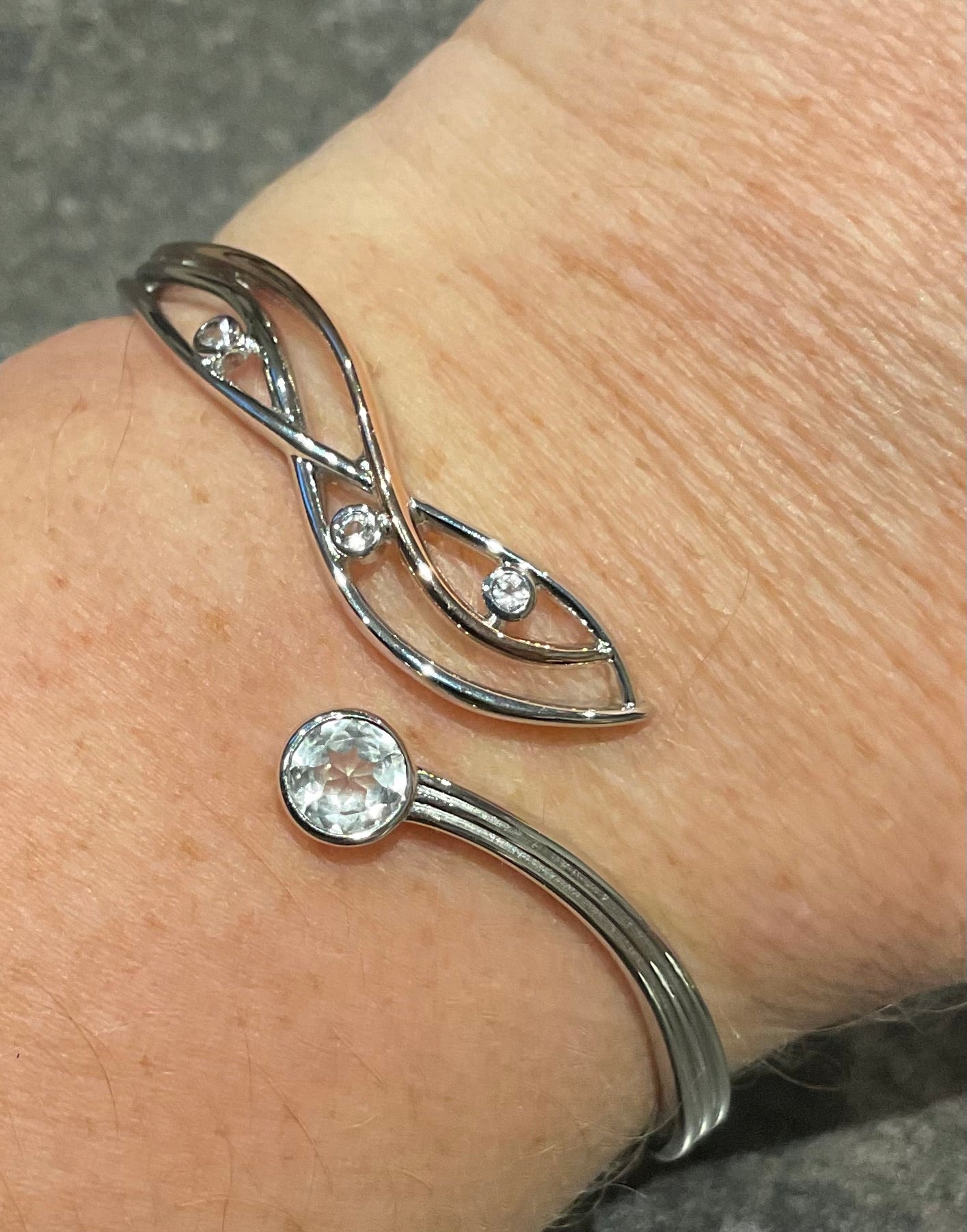 Clogau Nature’s Wonder Swallow Falls Waterfall White Topaz bangle in silver and rose gold