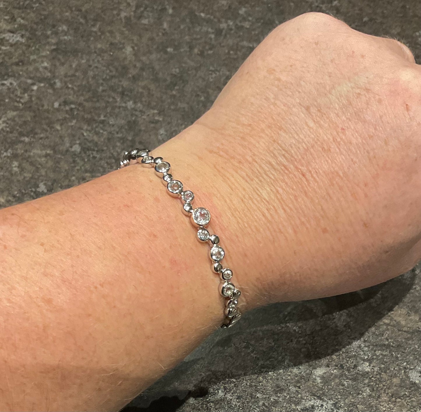 Clogau Celebration White Topaz bangle bracelet in silver and rose gold