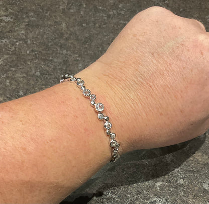 Clogau Celebration White Topaz bangle bracelet in silver and rose gold