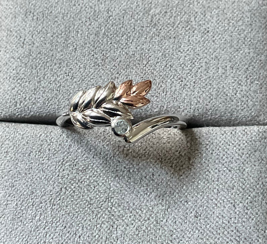 Clogau Lilibet Sky Blue Topaz ring in silver and rose gold sizes M, R and T