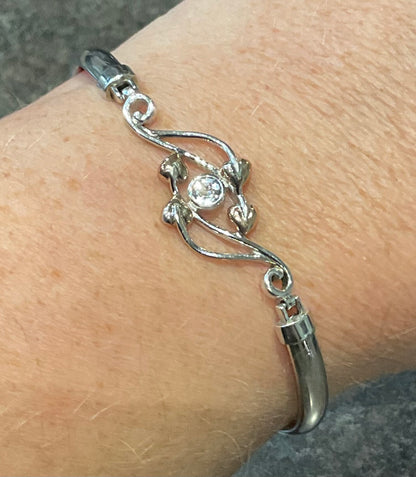 Clogau Blue Topaz Tree of Life Love Vine bangle bracelet in silver and rose gold open top hinged