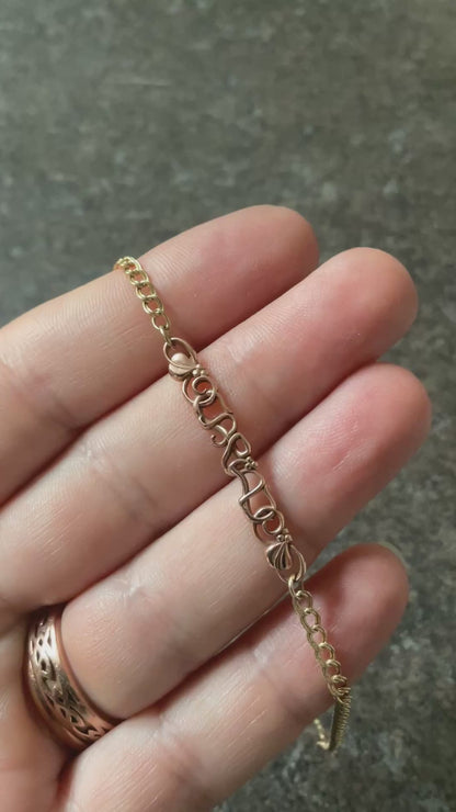 Vintage Clogau 9ct Cariad bracelet with safety padlock in yellow and rose gold