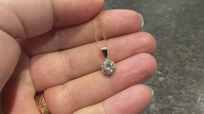 IBB 9ct Cubic Zirconia round bezel set solitaire pendant on 16" fine trace chain