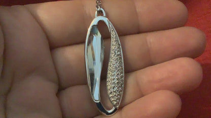 Swarovski ‘Harmony’ clear crystal large oval silver tone pendant necklace