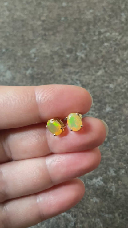 10K Ethiopian Welo Opal Oval cut stud earrings 8x6mm yellow gold TGGC
