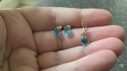 10K Blue topaz pendant 16” necklace and stud earring set yellow gold